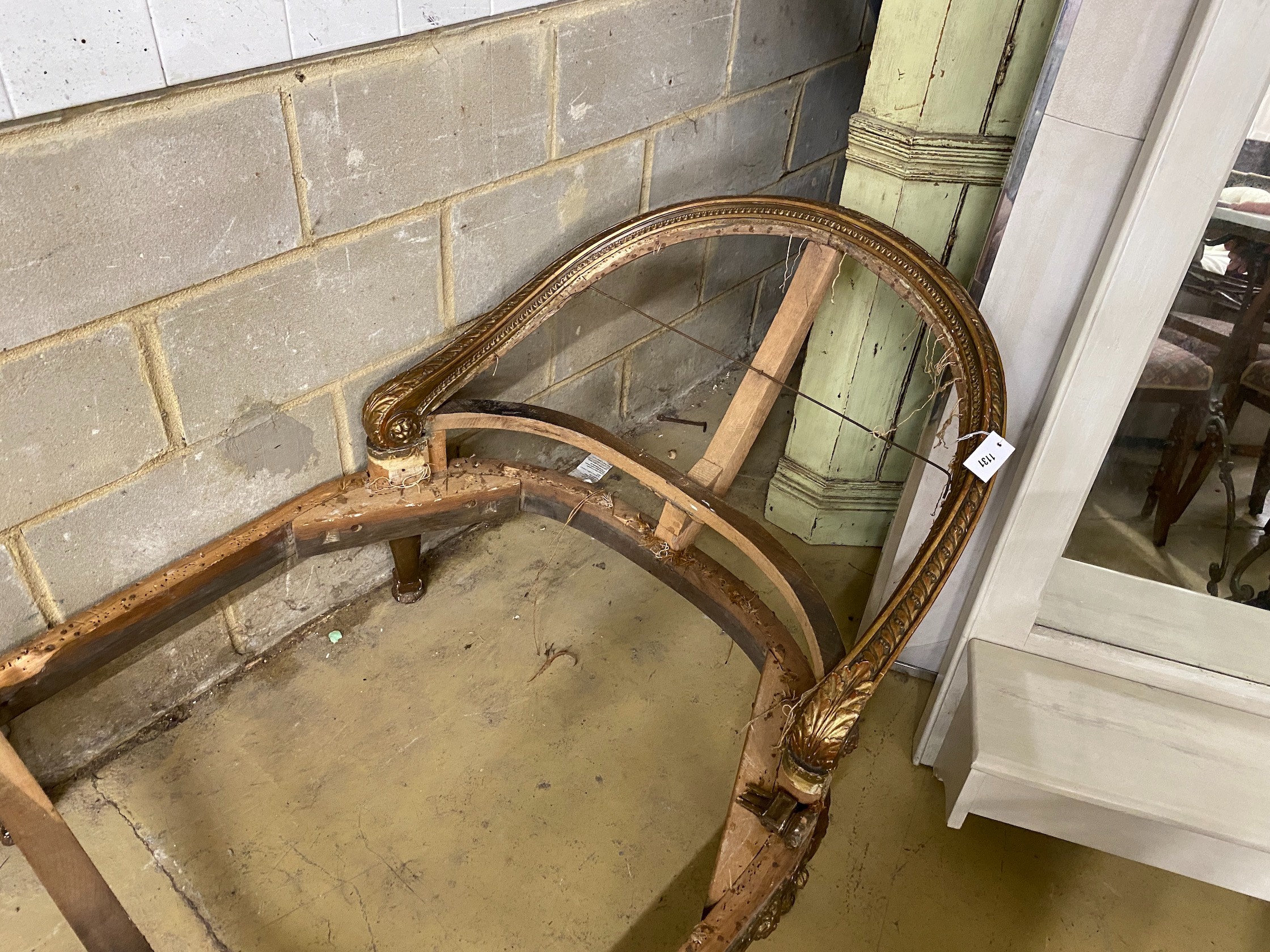 A 19th century French carved giltwood daybed frame, length 224cm, depth 90cm, height 75cm